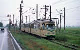 Niveaugleiche Kreuzung mit einer elektrifizierten Staatsbahnstrecke an der Stadtgrenze von Arad 1998
